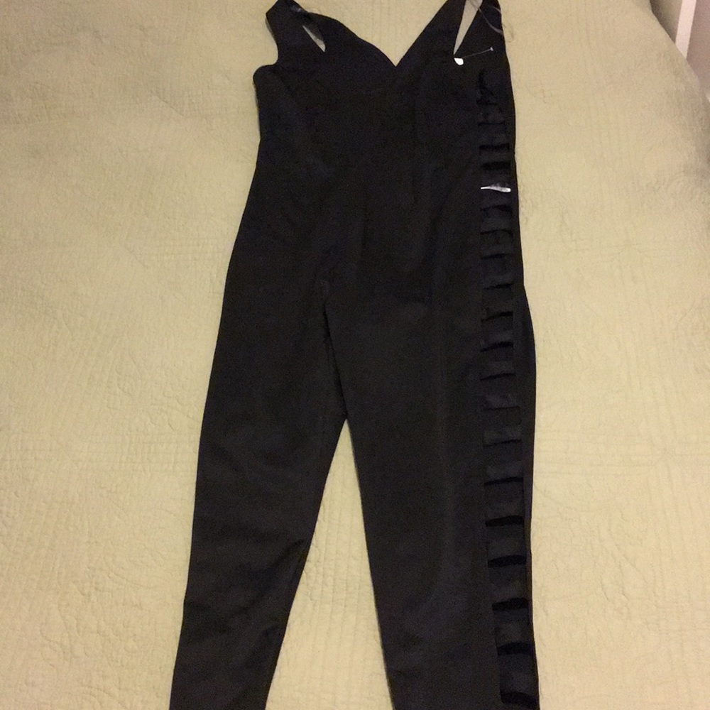 Black jumper NWT! Slits down both sides!
